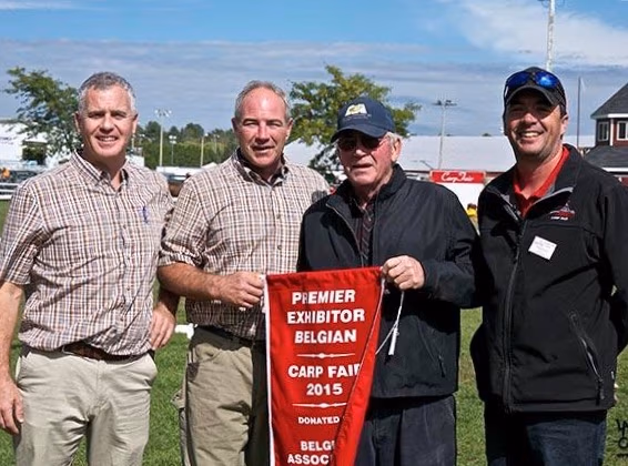 McWilliams being presented the Premier Belgian Exhibitor awards at the Carp Fair